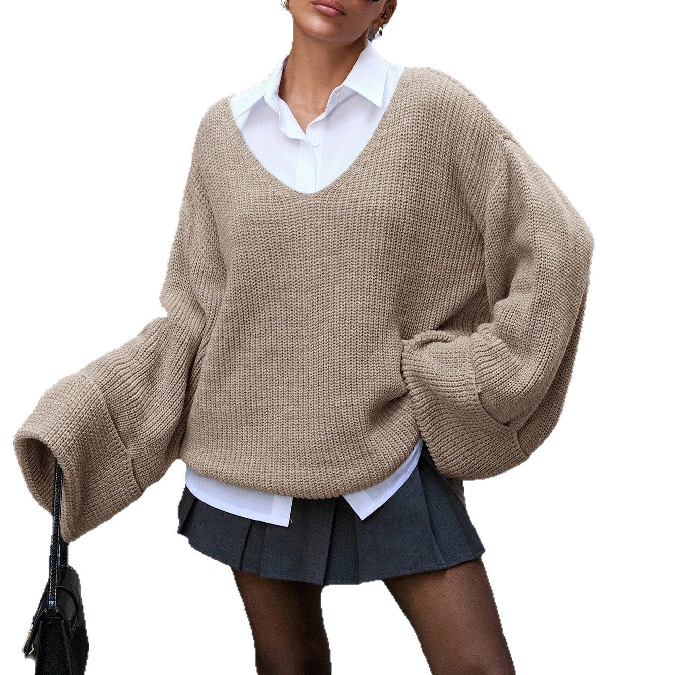 Ladies oversized knitted pullover with deep V-neck Chic and Style