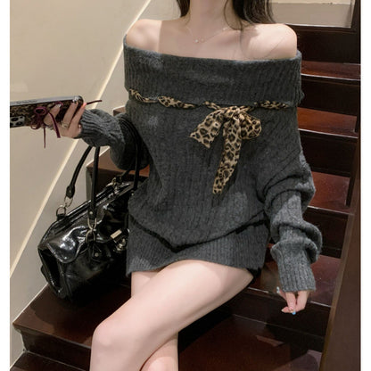 Pull en grosses mailles pour femmes avec épaule dénudée et accent de nœud ludique Chic und Stil