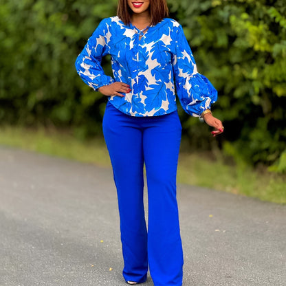 Women Elegant set consisting of a casual blouse with voluminous sleeves and classic pants Chic and Style