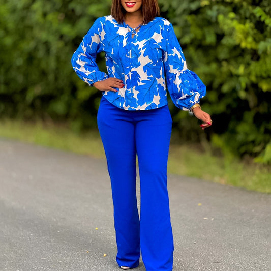 Women Elegant set consisting of a casual blouse with voluminous sleeves and classic pants Chic and Style