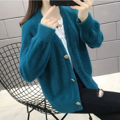 Ladies plush pullover with stylish button details Chic und Stil