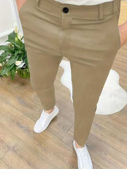 Trendy slim-fit pants for men with elastic waistband and practical pockets Chic and Style
