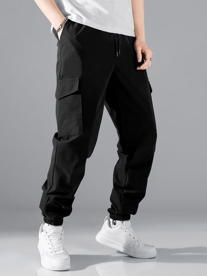 Pantalon cargo décontracté pour hommes avec taille élastique et poches latérales pratiques Chic und Stil