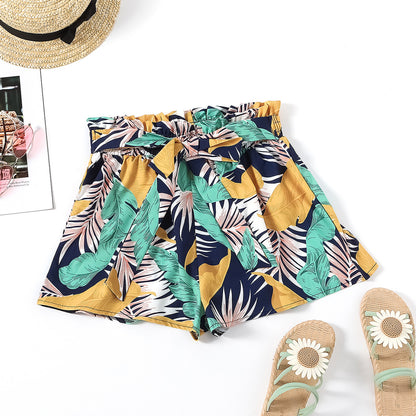 Shorts pour femmes avec motif floral et taille élastique Chic und Stil