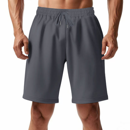 Pantalons de sport respirants pour hommes avec taille élastique et poches latérales Chic und Stil