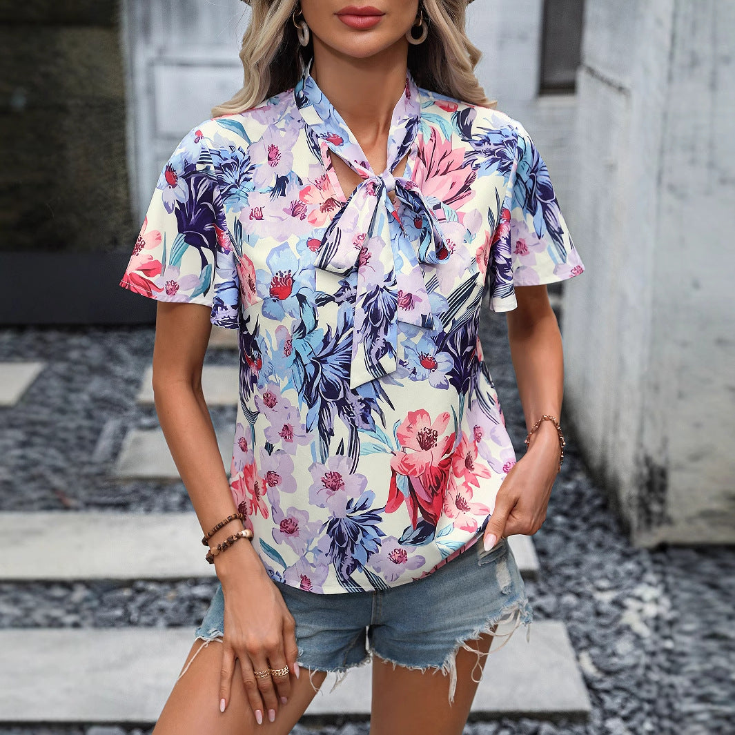 Chemisier femme avec motif à boucles et fleurs Chic und Stil