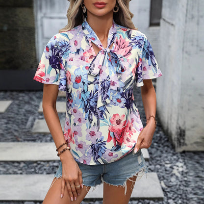 Chemisier femme avec motif à boucles et fleurs Chic und Stil