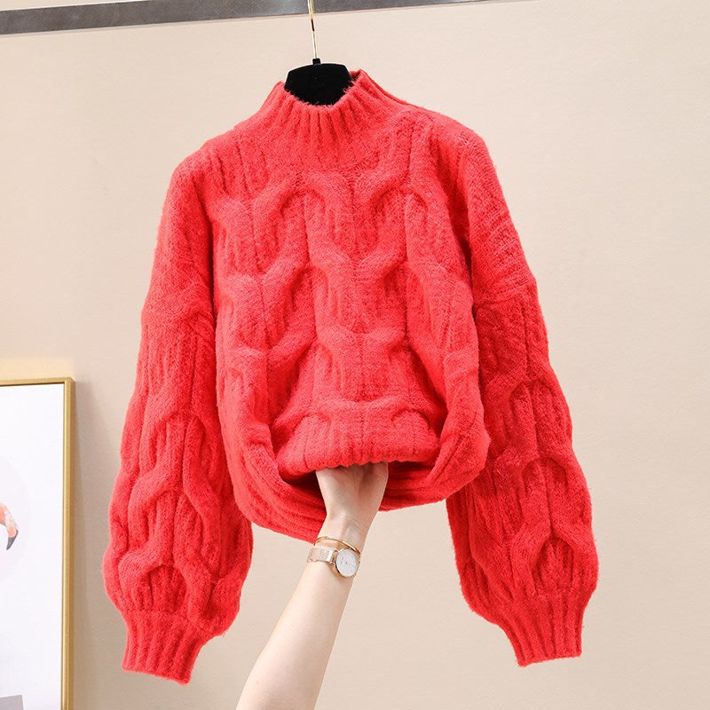 Pull en tricot confortable pour femmes avec des manches volumineuses et un motif torsadé Chic und Stil
