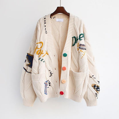 Dames cardigan en tricot doublé avec des boutons colorés et un design unique Chic und Stil