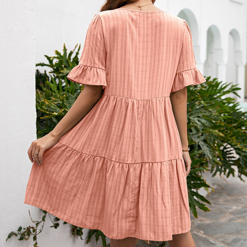 Robe midi légère pour femmes avec détails de boutons et ourlet asymétrique Chic und Stil