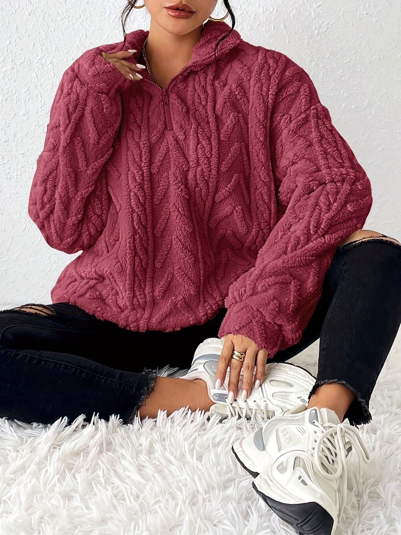Pull femme en polaire avec col haut et design structuré Chic und Stil