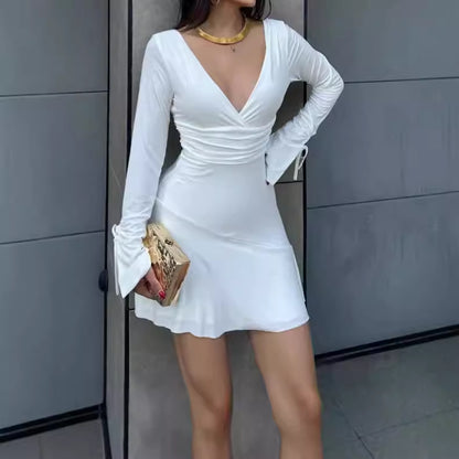 Robe portefeuille pour femmes avec manches longues et nœuds décoratifs Chic und Stil
