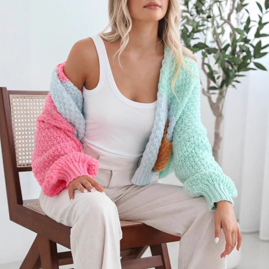 Pull en maille confortable pour dames avec des manches oversize et une combinaison de couleurs Chic und Stil