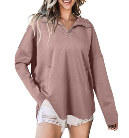 Pull en gros classique pour femmes avec demi-fermeture éclair et poches latérales Chic und Stil