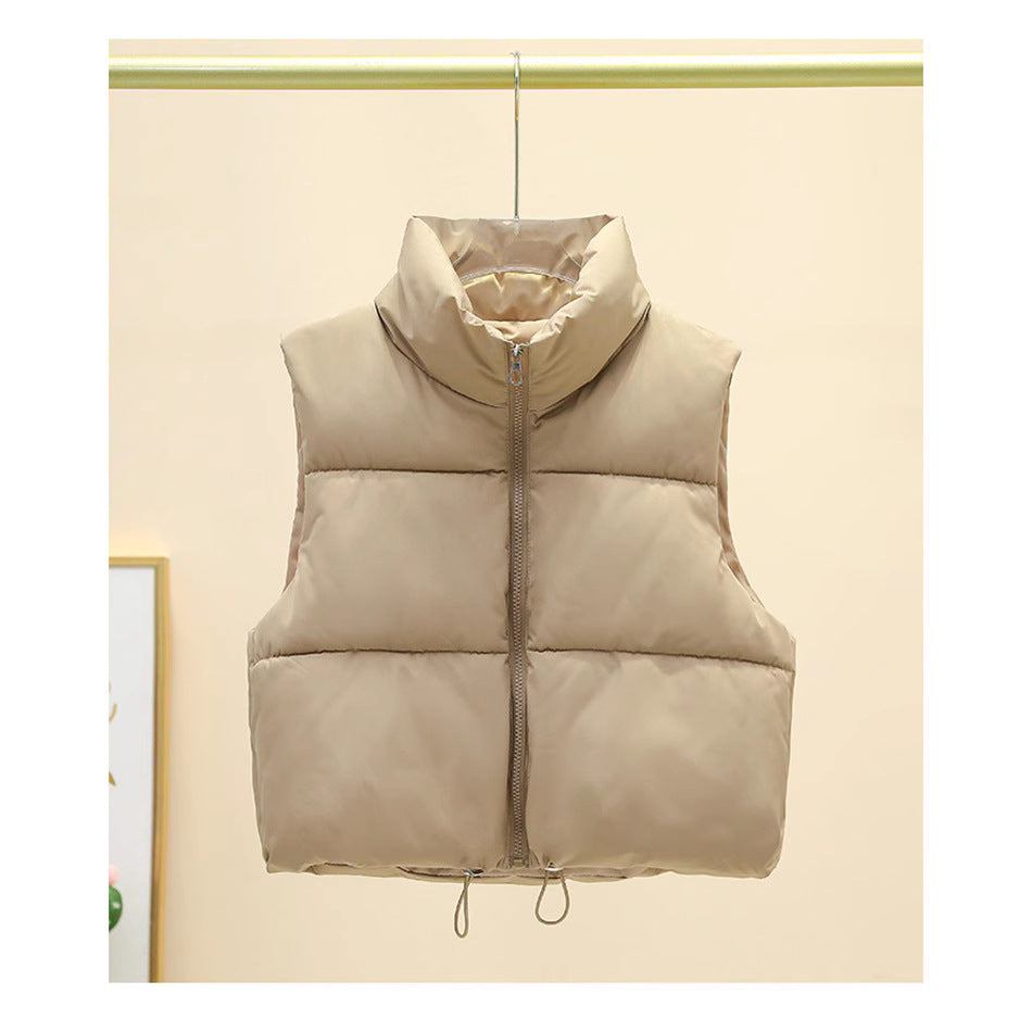 Dames gilet matelassé avec col haut et taille ajustable Chic und Stil