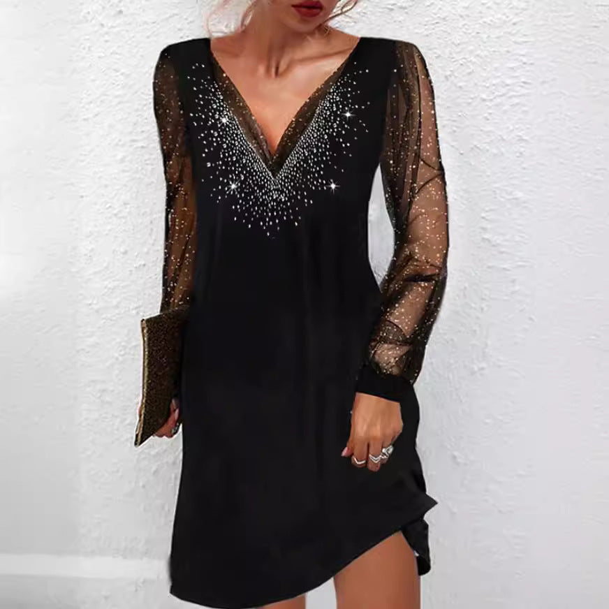 Robe de soirée élégante pour dames avec des accents scintillants et des manches transparentes Chic und Stil