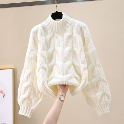 Pull en tricot confortable pour femmes avec des manches volumineuses et un motif torsadé Chic und Stil
