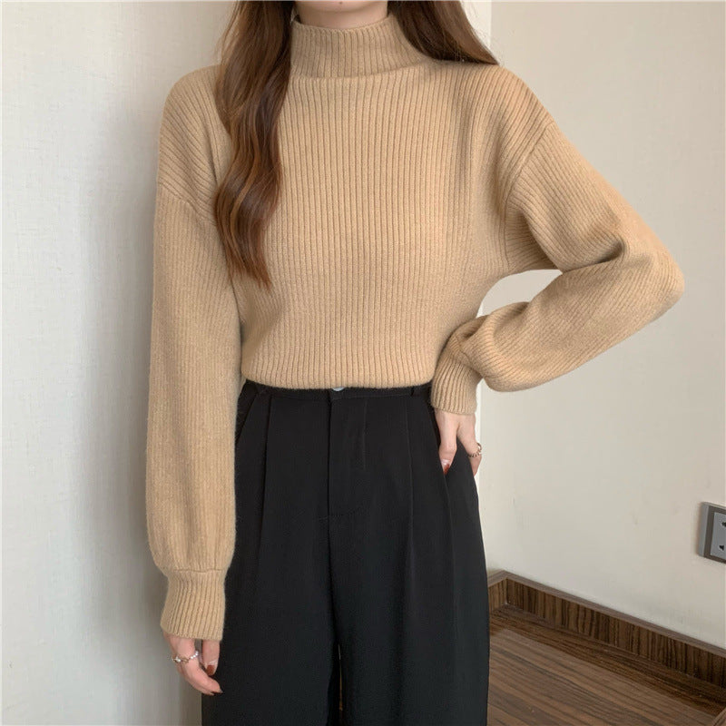 Pull femme tendance avec col montant et structure côtelée Chic und Stil
