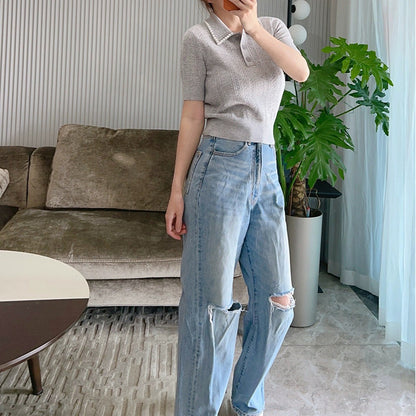 Top polo en tricot texturé pour femme avec détail en perles Chic und Stil