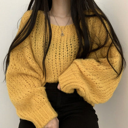 Pull en tricot décontracté pour femmes avec des manches bouffantes volumineuses et une structure en tricot ouverte Chic und Stil