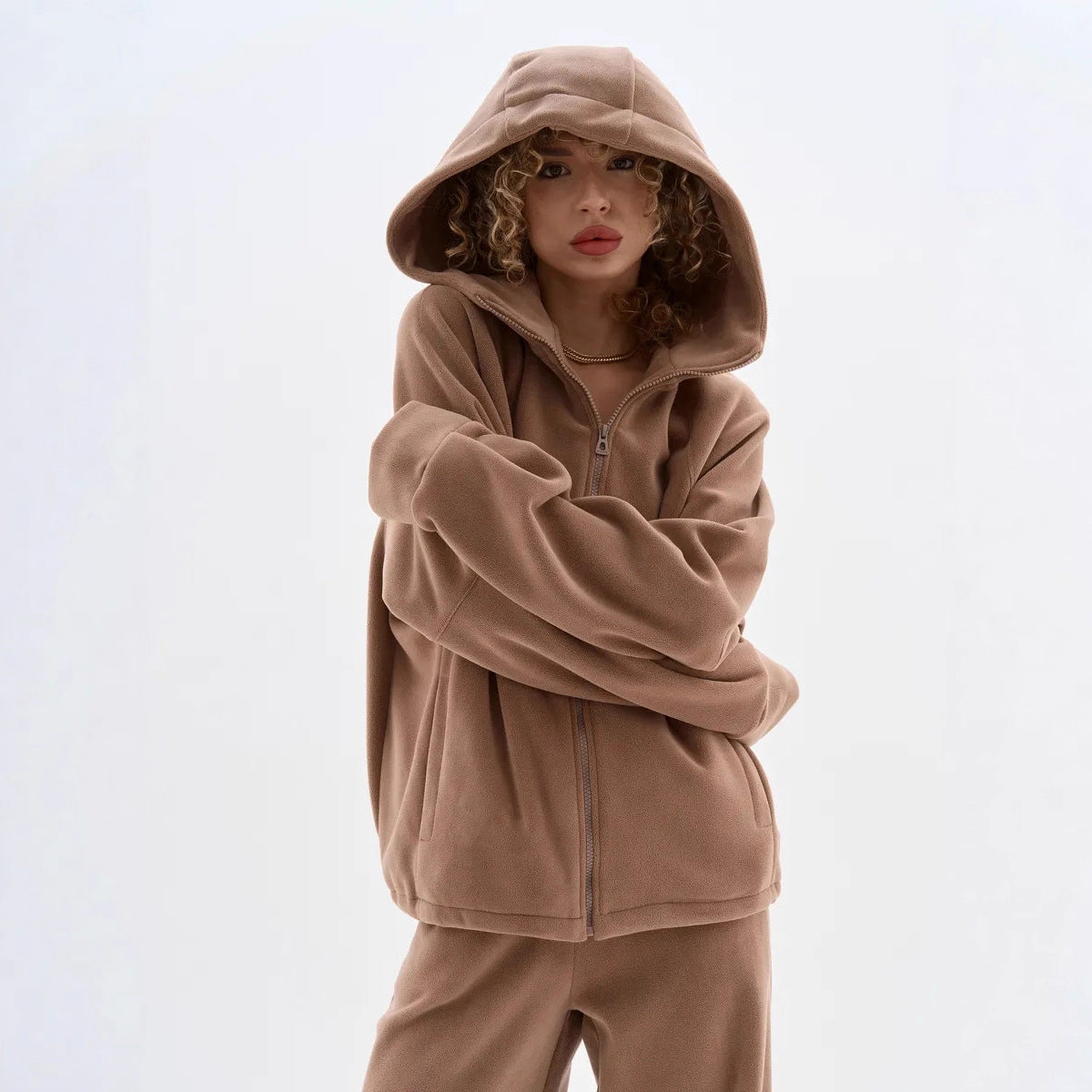 Dame Veste en polaire avec haute fermeture éclair et manches larges Chic und Stil