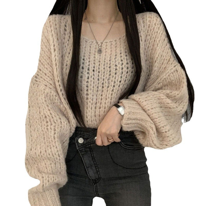 Pull en tricot décontracté pour femmes avec des manches bouffantes volumineuses et une structure en tricot ouverte Chic und Stil