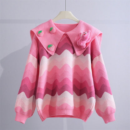 Pull en tricot pour femme avec des appliques ludiques et un motif en vagues Chic und Stil