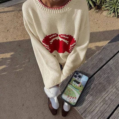 Pull en tricot pour femmes avec un design de créature grimpante Chic und Stil