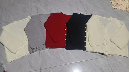 Women's comfortable knitted vest with button closure and chic, stylish V-neck