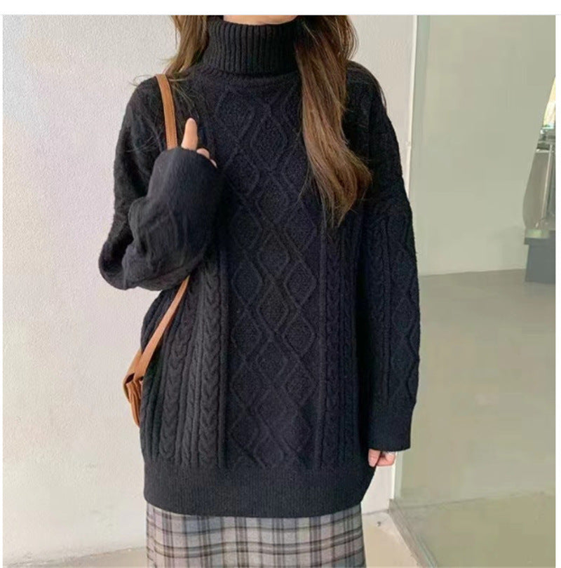Pull en gros tricot pour femmes avec col haut et motif en torsades Chic und Stil