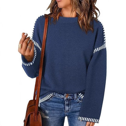 Pull féminin à la mode avec un matériau structuré et des détails en forme de rayures Chic und Stil