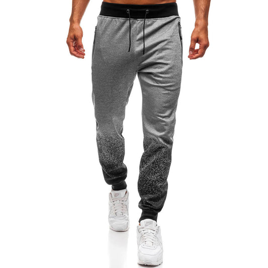 Pantalon de jogging sportif pour hommes avec dégradé de couleurs raffiné et poches à fermeture éclair pratiques Chic und Stil
