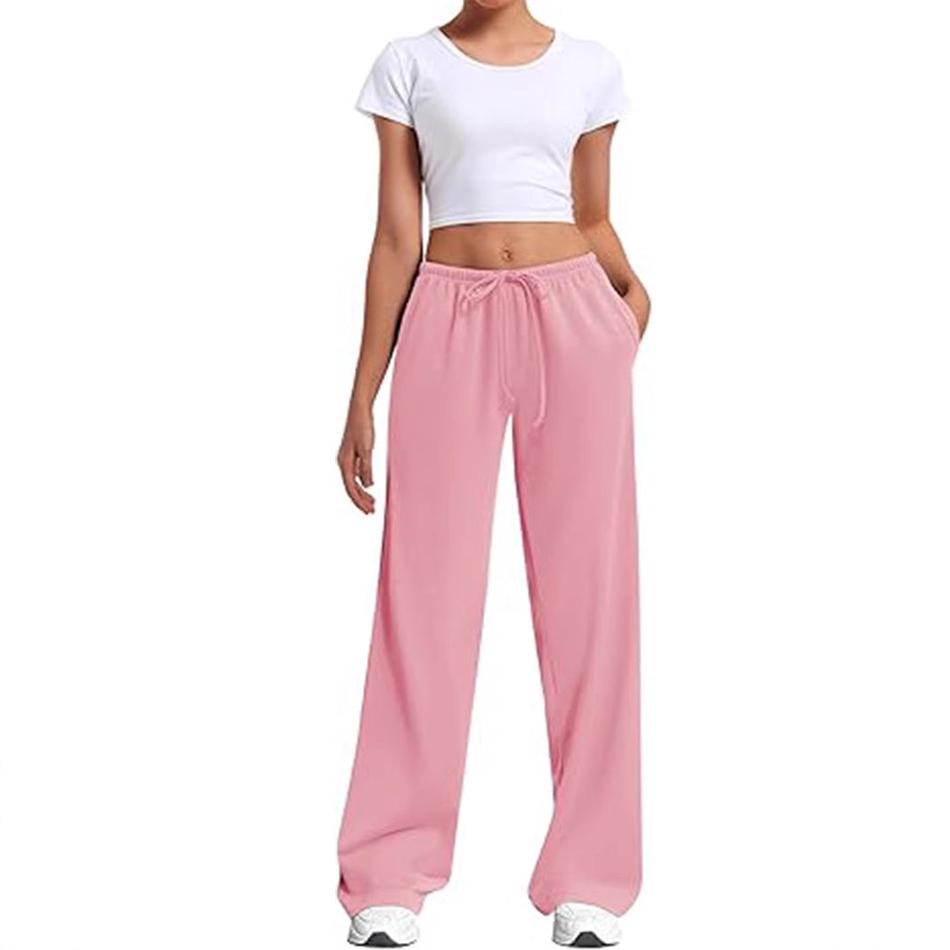 Loose sports pants for women with elastic waistband and side pockets Chic und Stil