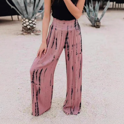Wide pleated pants for ladies with elastic waistband and trendy pattern Chic und Stil