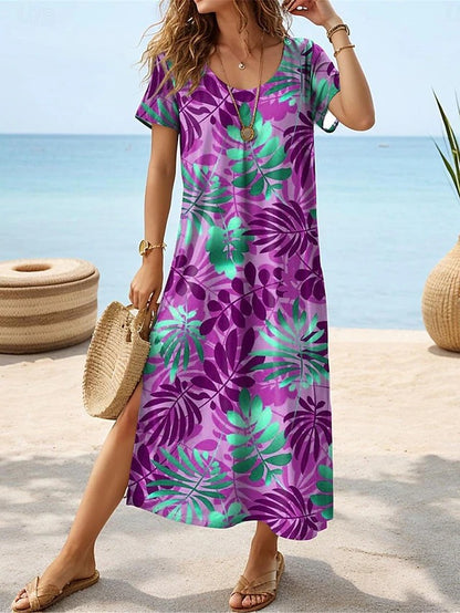 Robe maxi pour femmes avec un design élégant de feuilles tropicales et des fentes latérales Chic und Stil