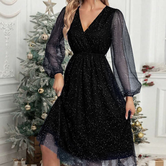 Robe midi glamour pour femmes avec des manches bouffantes transparentes et un motif de sequins scintillants Chic und Stil
