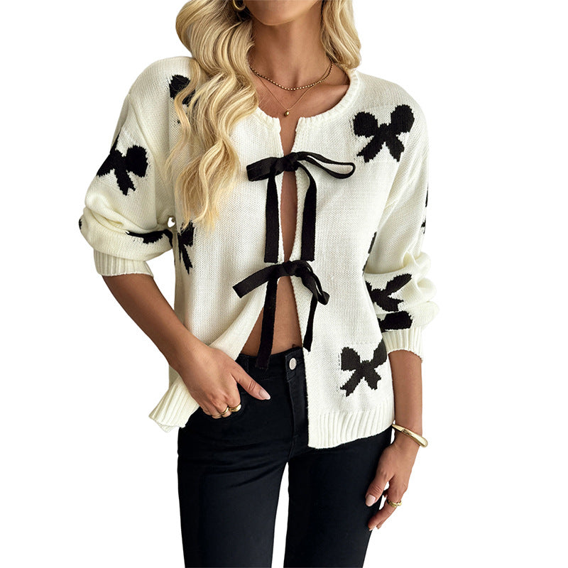 Pull femme avec motif de nœuds et coupe confortable Chic und Stil