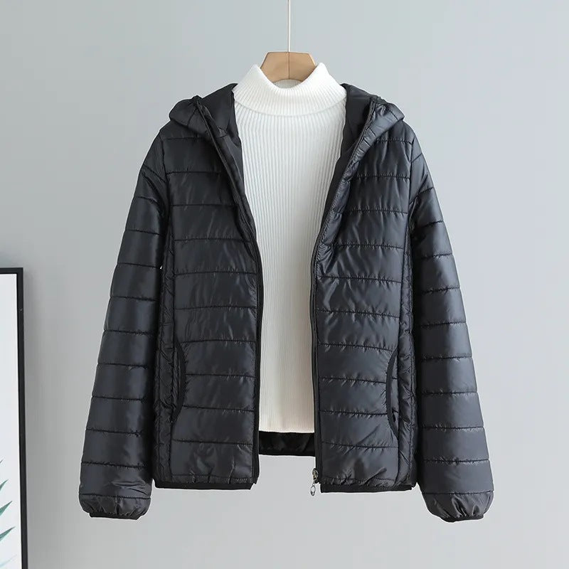 Ladies quilted transitional jacket with practical pockets and hood Chic und Stil