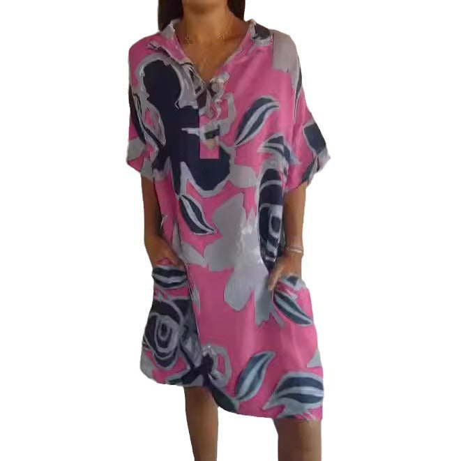 Robe de plage aérienne pour dames avec motif tendance et poches latérales Chic und Stil