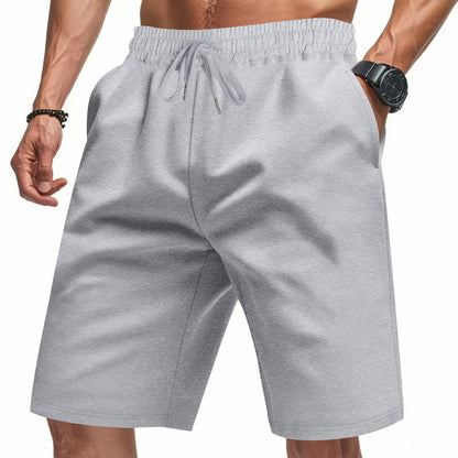 Pantalons de sport respirants pour hommes avec taille élastique et poches latérales Chic und Stil