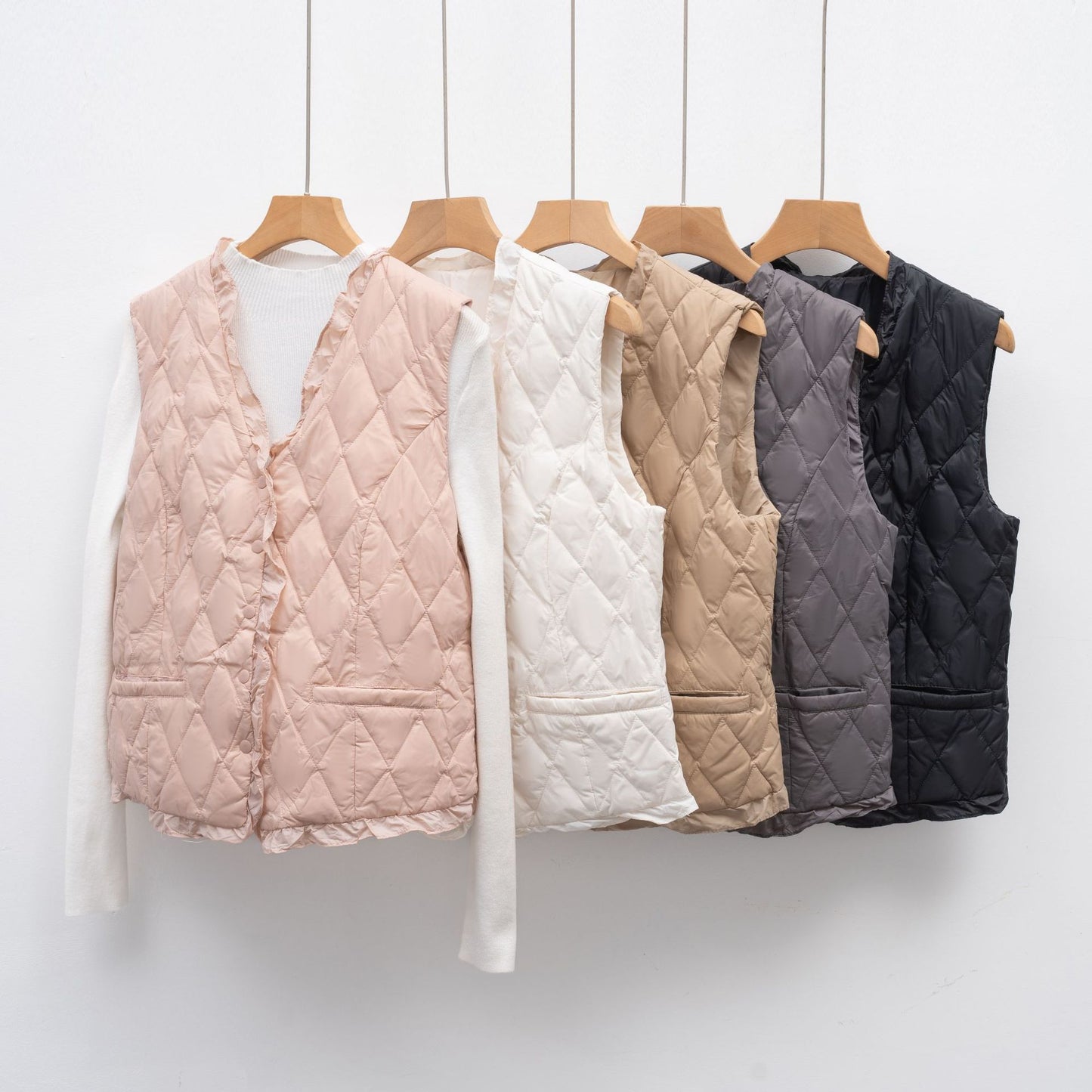 Dames gilet matelassé avec coupe asymétrique Chic und Stil