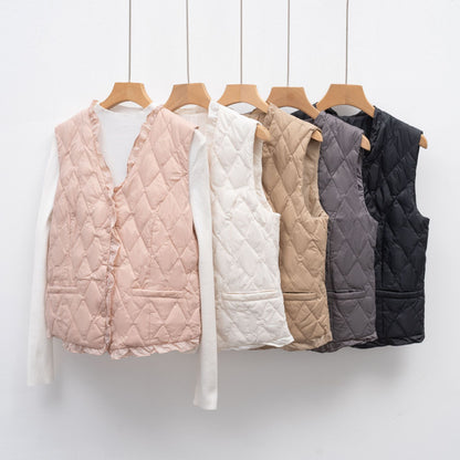 Dames gilet matelassé avec coupe asymétrique Chic und Stil