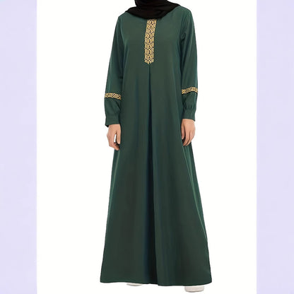 Robe kaftan pour femmes avec des accents dorés élégants et des manches longues Chic und Stil