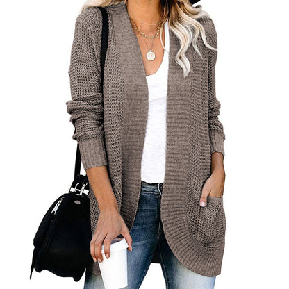 Veste en tricot pour femmes avec un motif de tricot moderne et des poches pratiques Chic und Stil