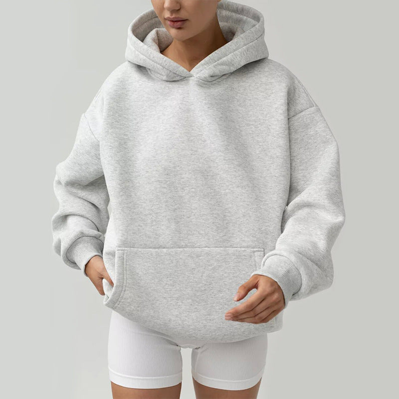 Dames Hoodie surdimensionné avec un design de poches kangourou pratique Chic und Stil
