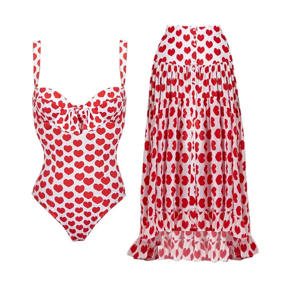 Chic and Style ladies swimsuit and skirt set with heart pattern