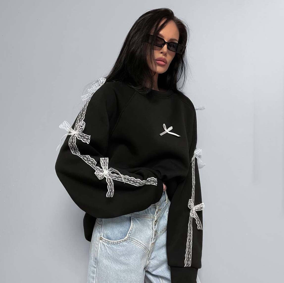 Dames élégant sweat-shirt avec des ceintures de lien uniques Chic und Stil