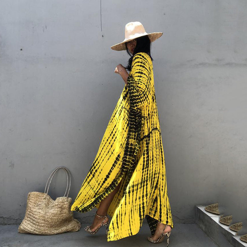 Robe maxi femme avec un motif batik stylé et des fentes latérales Chic und Stil