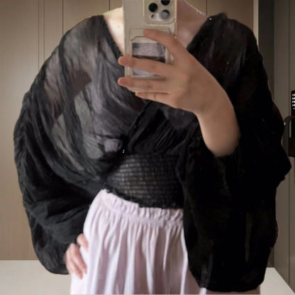 Blouse drapée pour femmes avec des manches volumineuses et un design élégant Chic und Stil