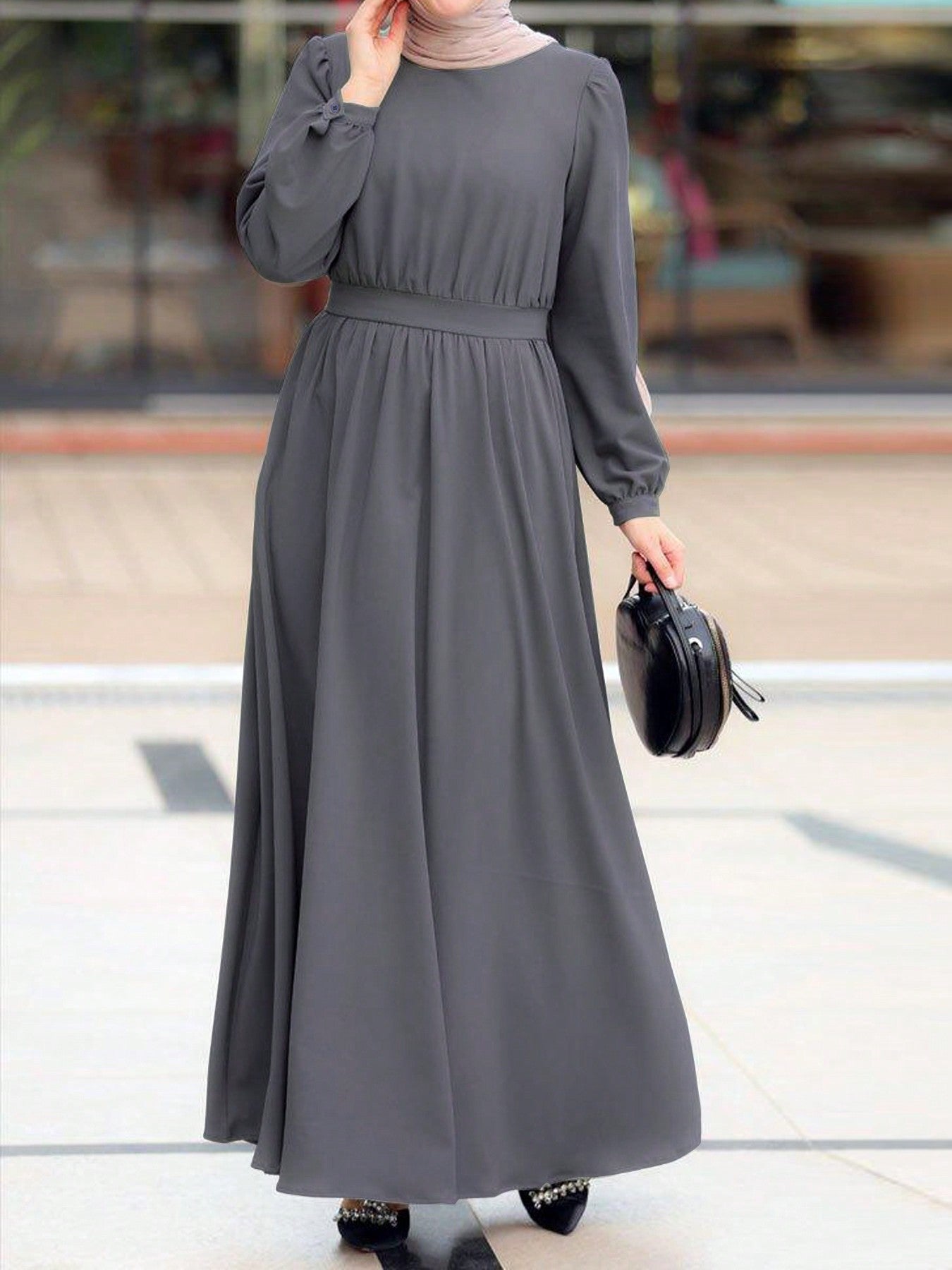 Robe maxi pour femmes avec ceinture élastique à la taille et manches longues Chic und Stil